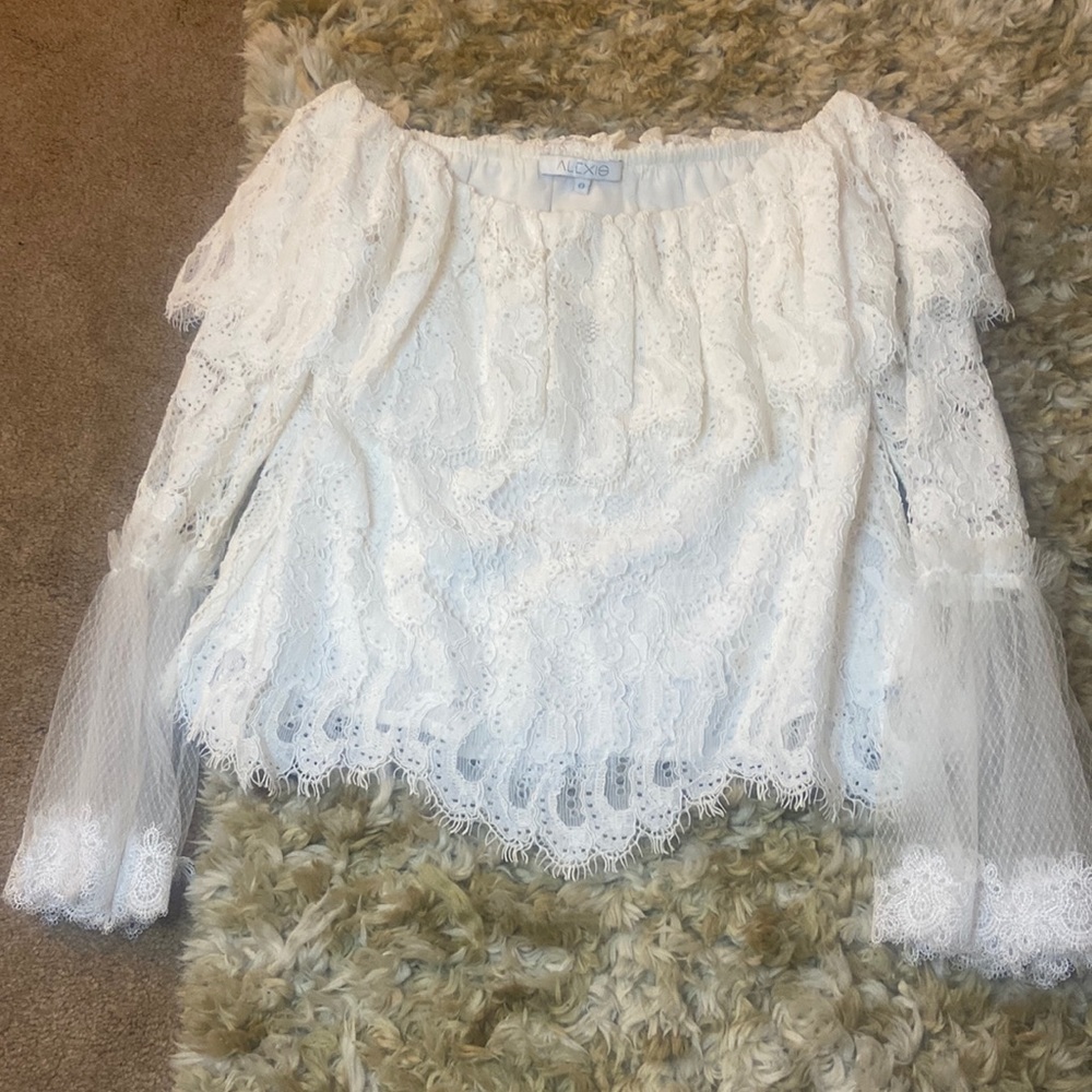 Designed Alexis blouse like new condition, white lace